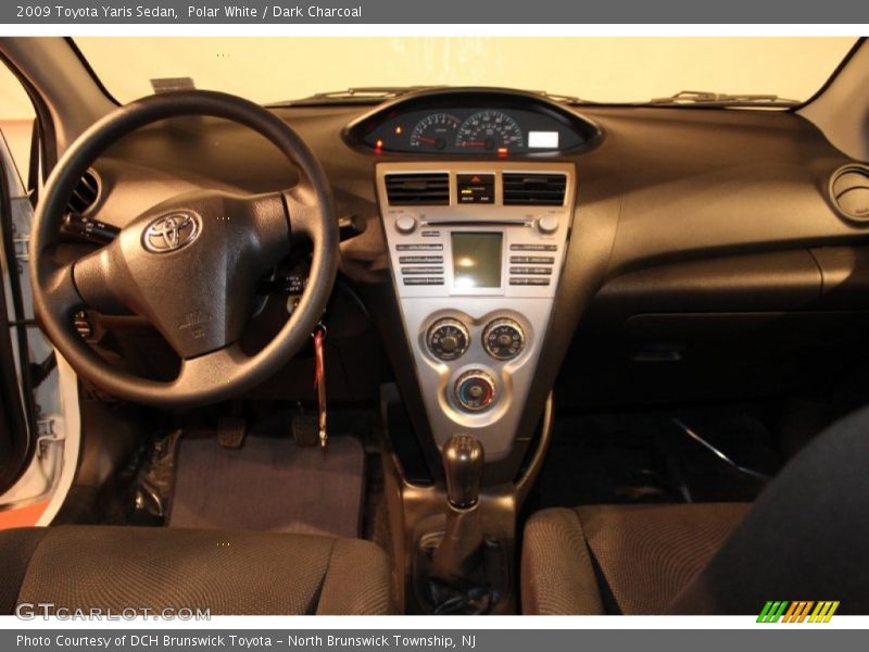 Polar White / Dark Charcoal 2009 Toyota Yaris Sedan