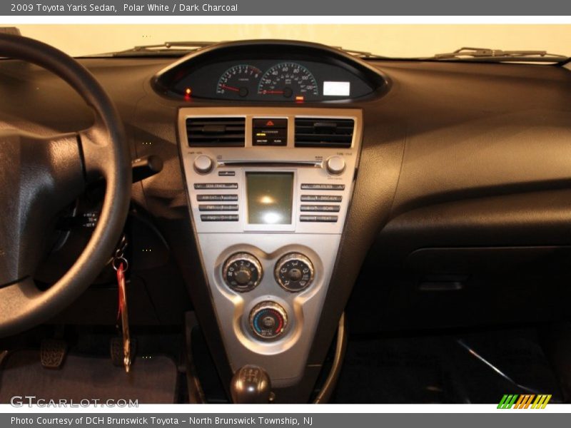 Polar White / Dark Charcoal 2009 Toyota Yaris Sedan