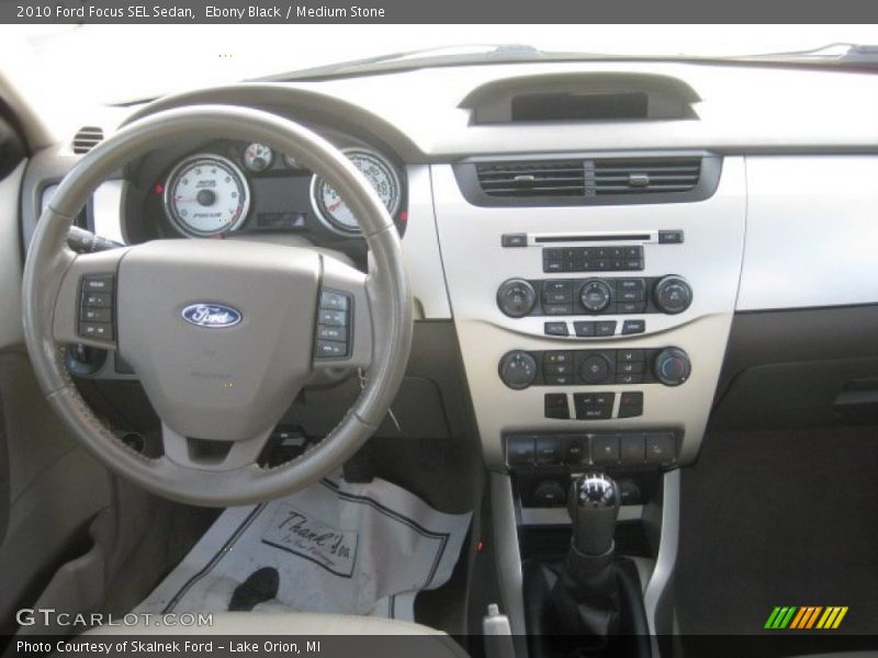 Ebony Black / Medium Stone 2010 Ford Focus SEL Sedan