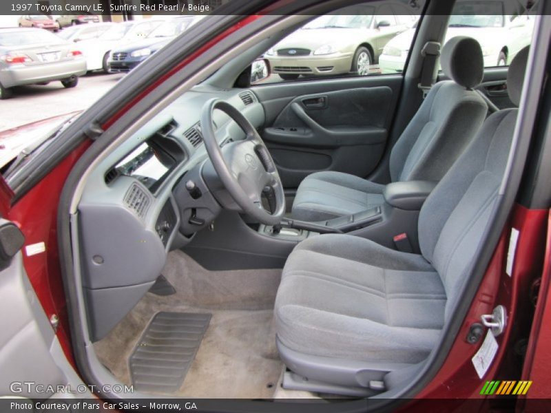 Sunfire Red Pearl / Beige 1997 Toyota Camry LE