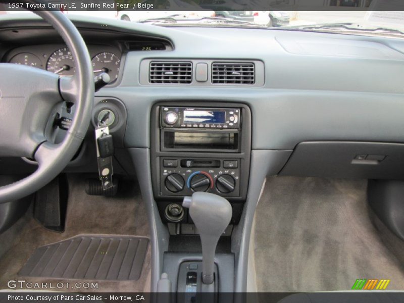 Sunfire Red Pearl / Beige 1997 Toyota Camry LE