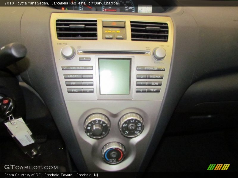 Barcelona Red Metallic / Dark Charcoal 2010 Toyota Yaris Sedan