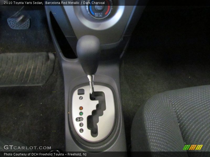 Barcelona Red Metallic / Dark Charcoal 2010 Toyota Yaris Sedan