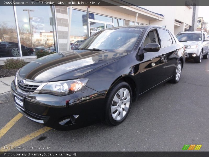 Obsidian Black Pearl / Ivory 2009 Subaru Impreza 2.5i Sedan