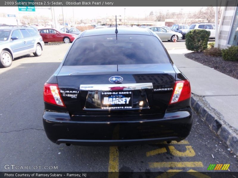 Obsidian Black Pearl / Ivory 2009 Subaru Impreza 2.5i Sedan
