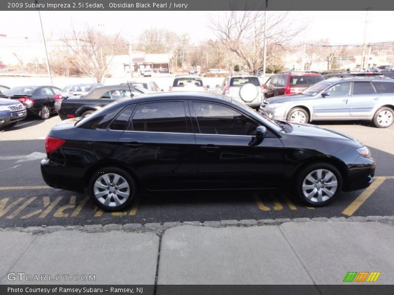 Obsidian Black Pearl / Ivory 2009 Subaru Impreza 2.5i Sedan