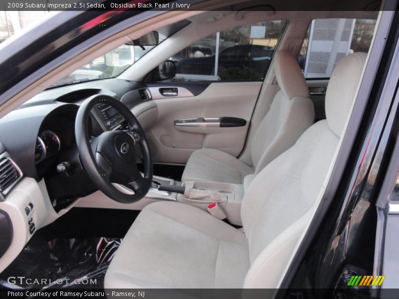 Obsidian Black Pearl / Ivory 2009 Subaru Impreza 2.5i Sedan