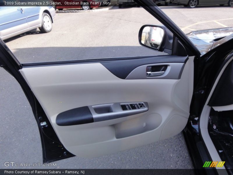 Obsidian Black Pearl / Ivory 2009 Subaru Impreza 2.5i Sedan