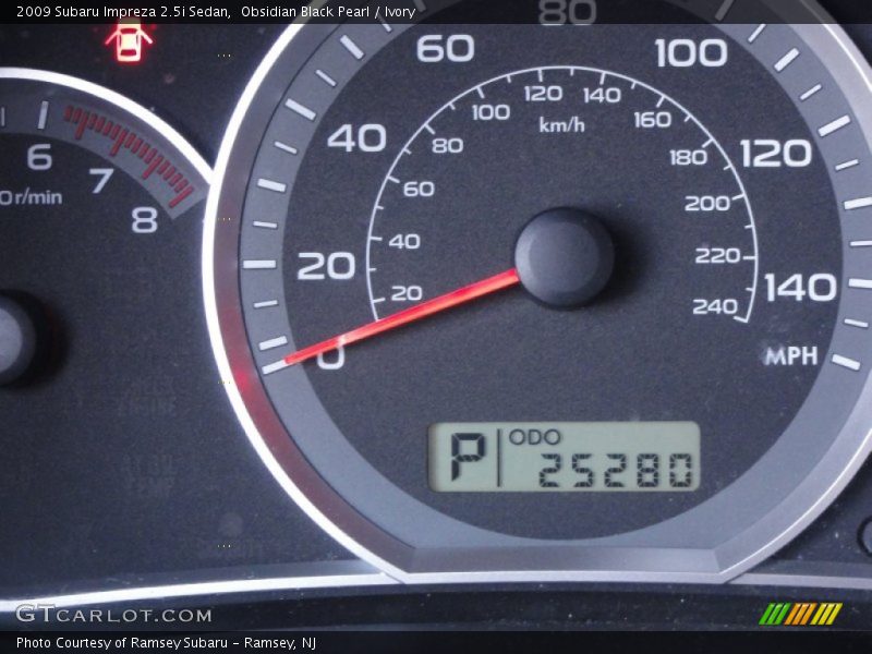Obsidian Black Pearl / Ivory 2009 Subaru Impreza 2.5i Sedan