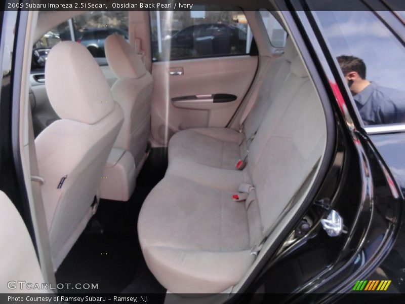 Obsidian Black Pearl / Ivory 2009 Subaru Impreza 2.5i Sedan
