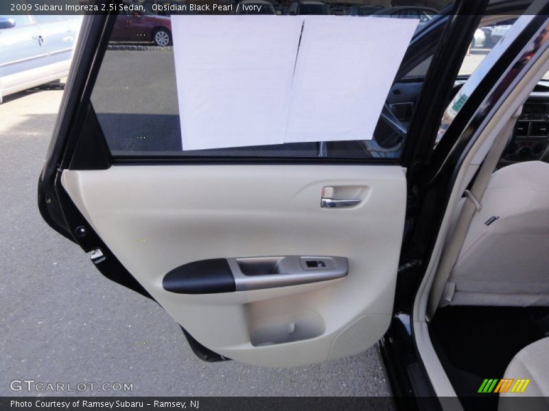 Obsidian Black Pearl / Ivory 2009 Subaru Impreza 2.5i Sedan
