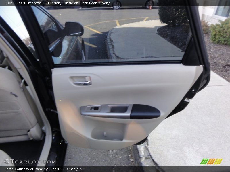 Obsidian Black Pearl / Ivory 2009 Subaru Impreza 2.5i Sedan