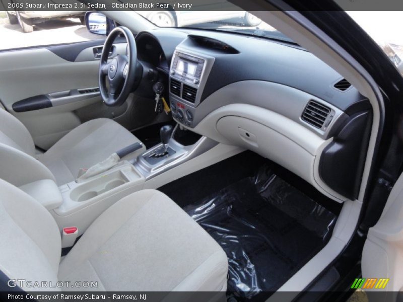 Obsidian Black Pearl / Ivory 2009 Subaru Impreza 2.5i Sedan