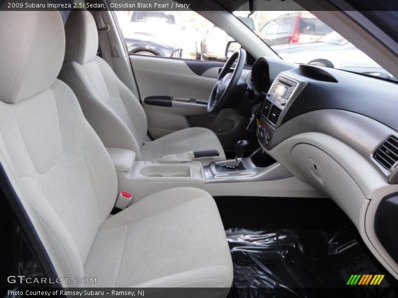 Obsidian Black Pearl / Ivory 2009 Subaru Impreza 2.5i Sedan