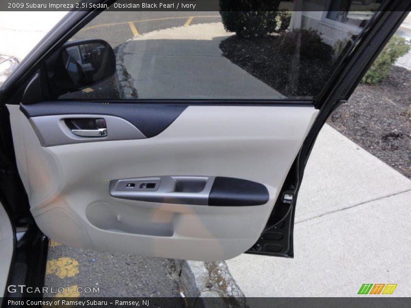 Obsidian Black Pearl / Ivory 2009 Subaru Impreza 2.5i Sedan