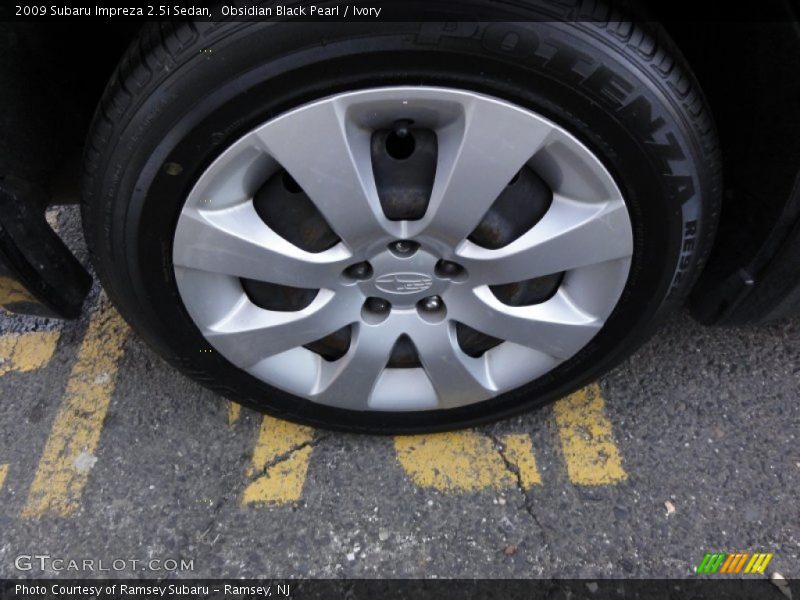 Obsidian Black Pearl / Ivory 2009 Subaru Impreza 2.5i Sedan