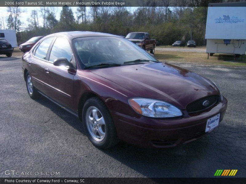 Merlot Metallic / Medium/Dark Pebble Beige 2006 Ford Taurus SE