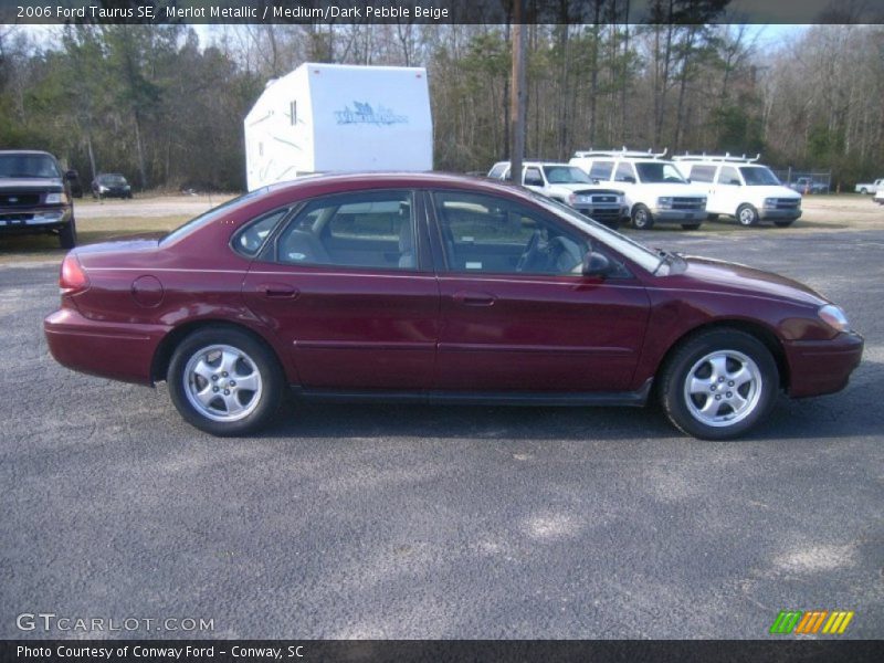 Merlot Metallic / Medium/Dark Pebble Beige 2006 Ford Taurus SE