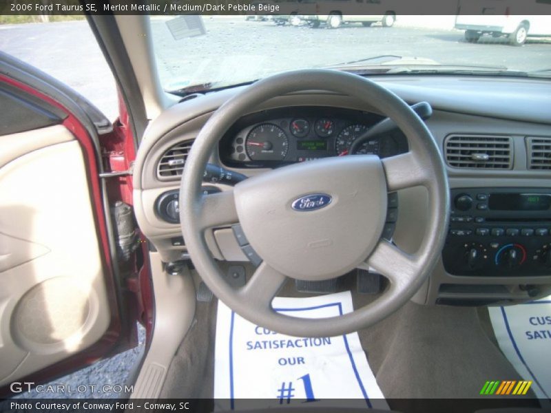 Merlot Metallic / Medium/Dark Pebble Beige 2006 Ford Taurus SE