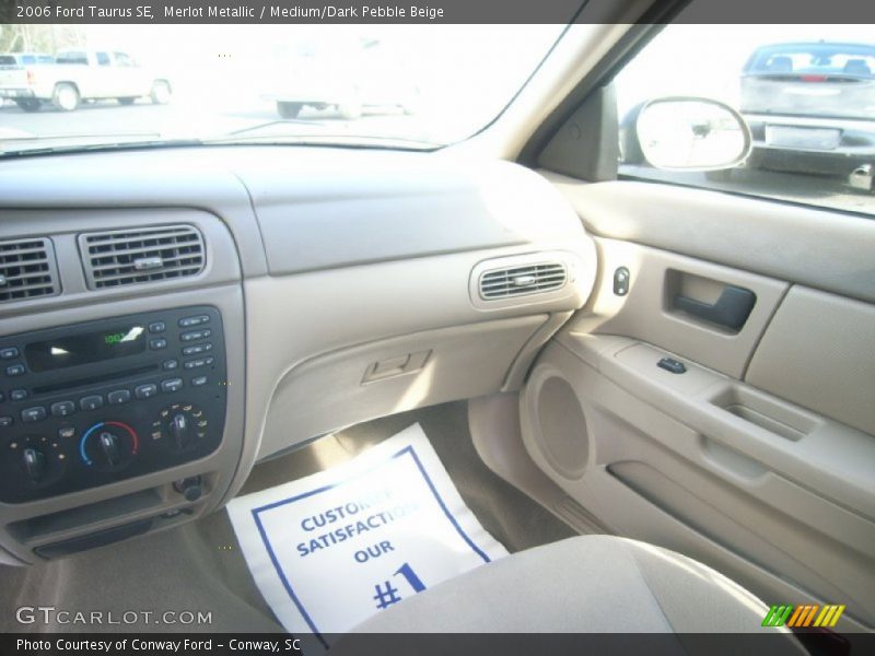 Merlot Metallic / Medium/Dark Pebble Beige 2006 Ford Taurus SE