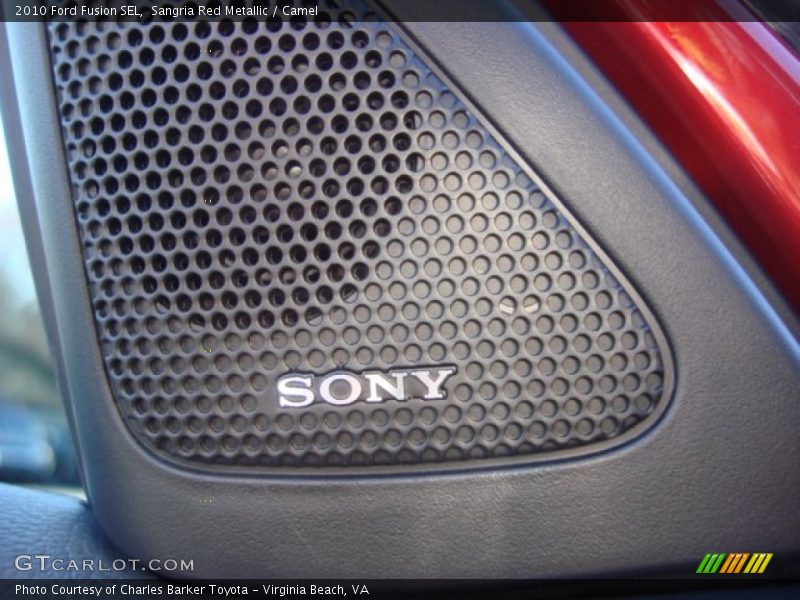 Sangria Red Metallic / Camel 2010 Ford Fusion SEL