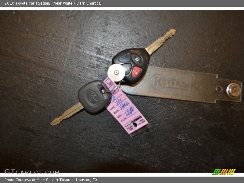Polar White / Dark Charcoal 2010 Toyota Yaris Sedan