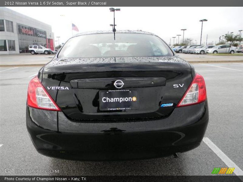 Super Black / Charcoal 2012 Nissan Versa 1.6 SV Sedan