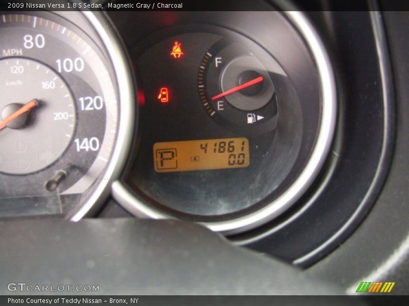 Magnetic Gray / Charcoal 2009 Nissan Versa 1.8 S Sedan