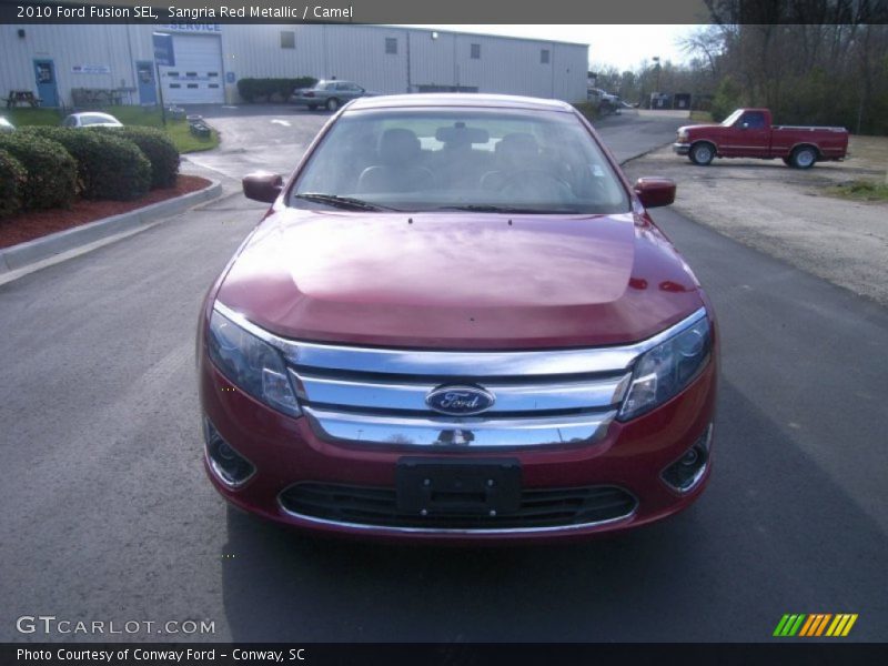 Sangria Red Metallic / Camel 2010 Ford Fusion SEL