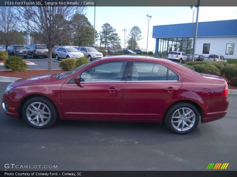 Sangria Red Metallic / Camel 2010 Ford Fusion SEL