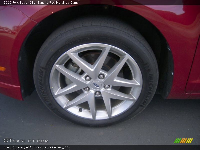 Sangria Red Metallic / Camel 2010 Ford Fusion SEL