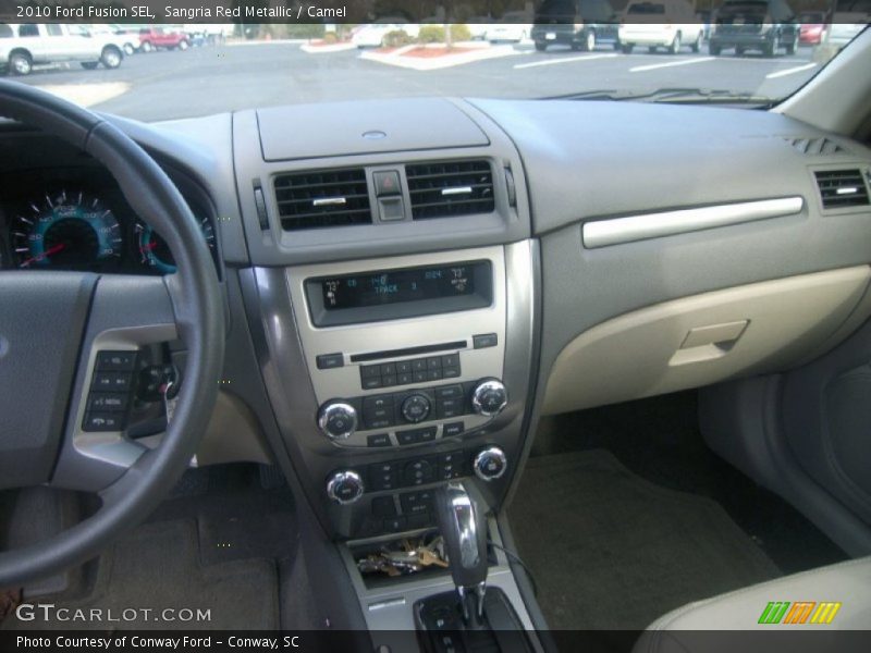 Sangria Red Metallic / Camel 2010 Ford Fusion SEL