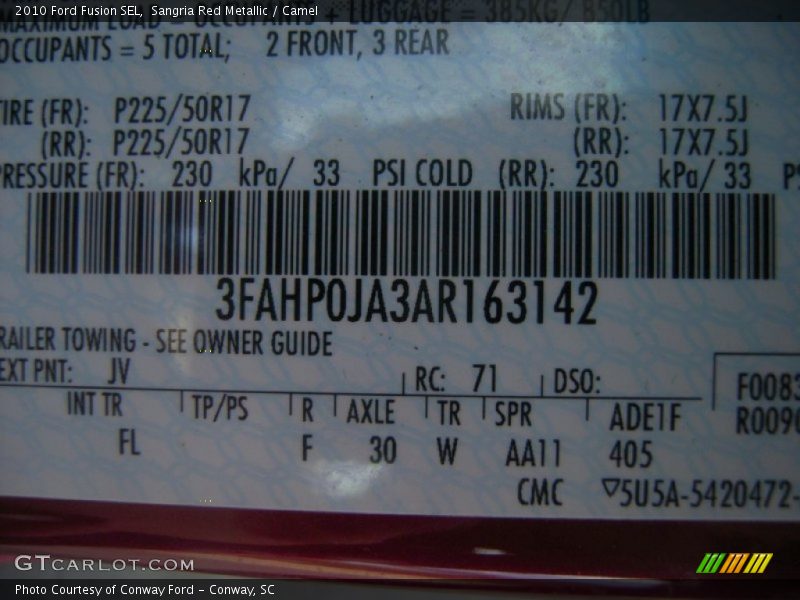 Sangria Red Metallic / Camel 2010 Ford Fusion SEL