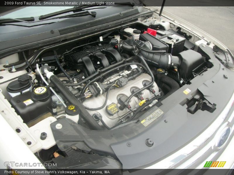 Smokestone Metallic / Medium Light Stone 2009 Ford Taurus SE