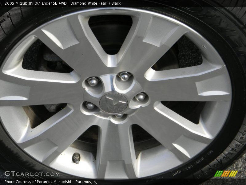 Diamond White Pearl / Black 2009 Mitsubishi Outlander SE 4WD