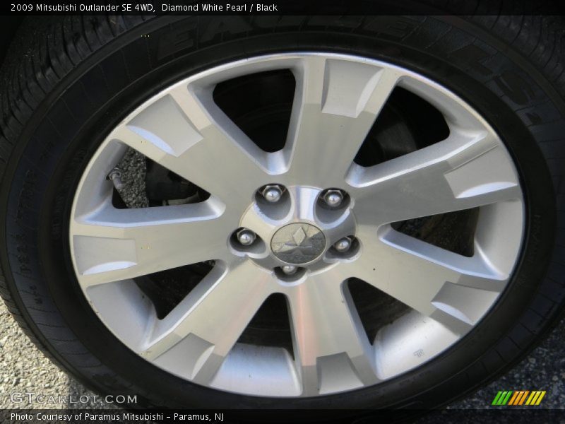 Diamond White Pearl / Black 2009 Mitsubishi Outlander SE 4WD