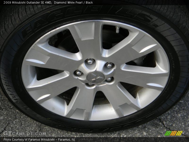Diamond White Pearl / Black 2009 Mitsubishi Outlander SE 4WD