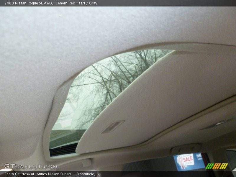 Venom Red Pearl / Gray 2008 Nissan Rogue SL AWD