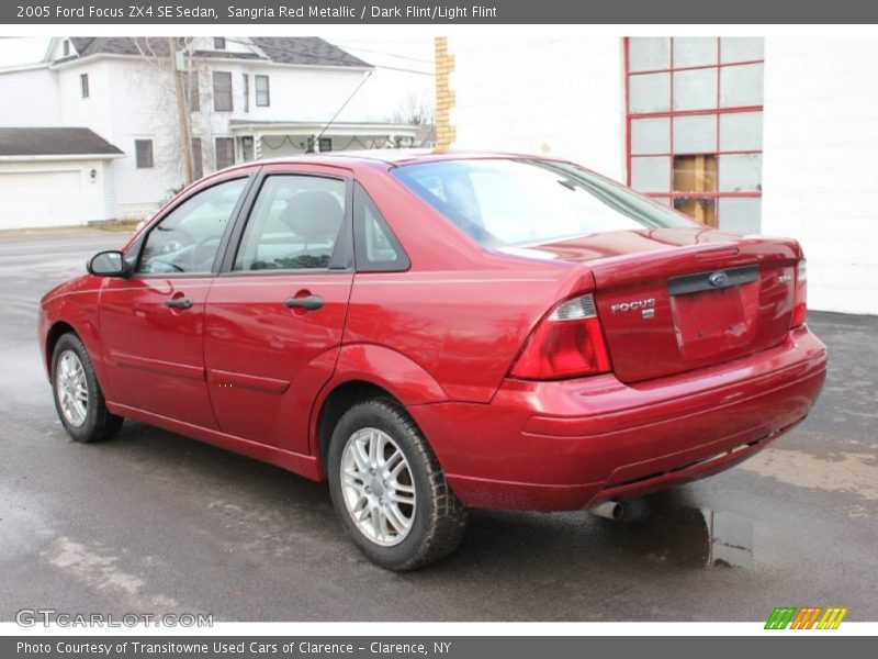 Sangria Red Metallic / Dark Flint/Light Flint 2005 Ford Focus ZX4 SE Sedan