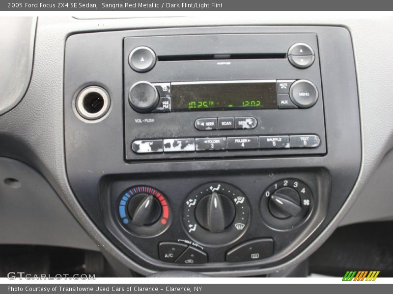 Sangria Red Metallic / Dark Flint/Light Flint 2005 Ford Focus ZX4 SE Sedan