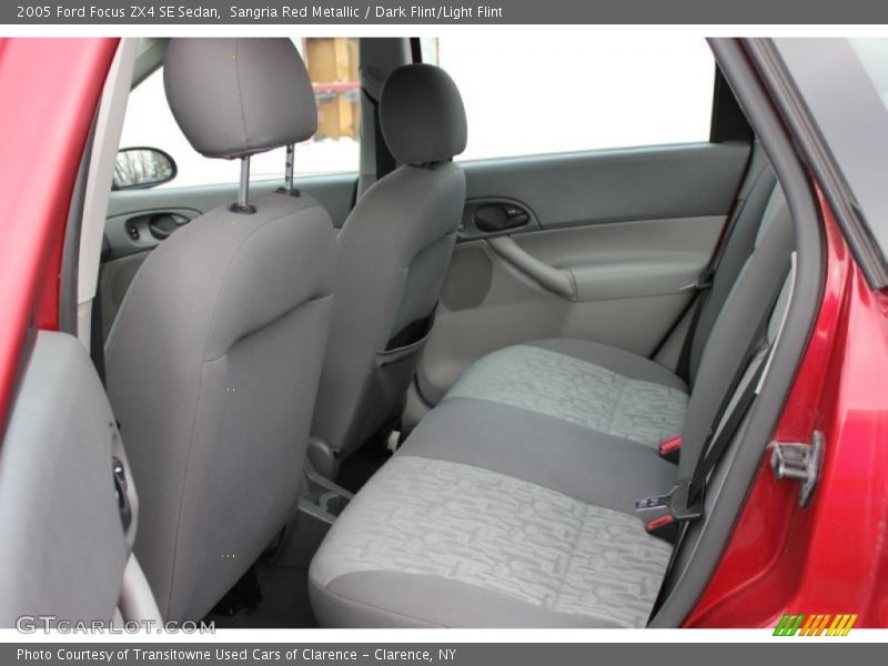 Sangria Red Metallic / Dark Flint/Light Flint 2005 Ford Focus ZX4 SE Sedan