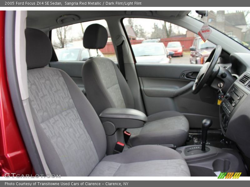 Sangria Red Metallic / Dark Flint/Light Flint 2005 Ford Focus ZX4 SE Sedan