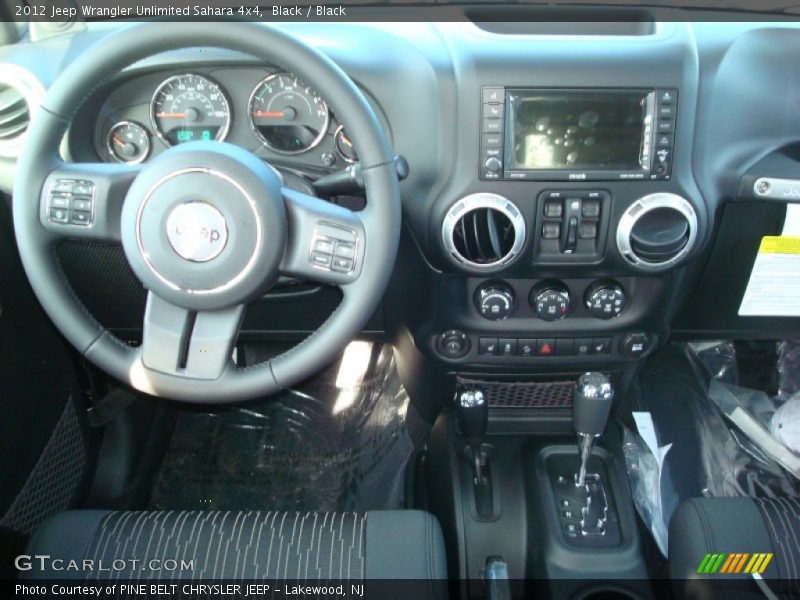Black / Black 2012 Jeep Wrangler Unlimited Sahara 4x4