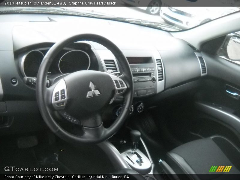 Graphite Gray Pearl / Black 2010 Mitsubishi Outlander SE 4WD