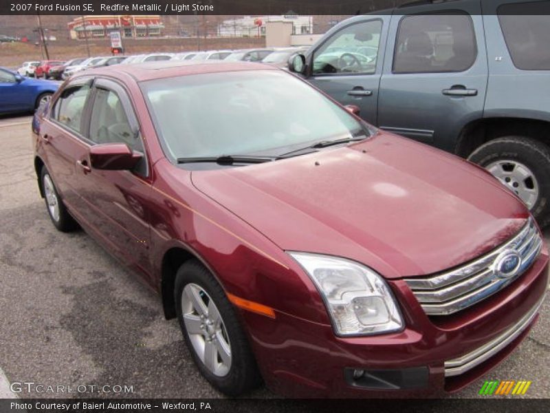 Redfire Metallic / Light Stone 2007 Ford Fusion SE