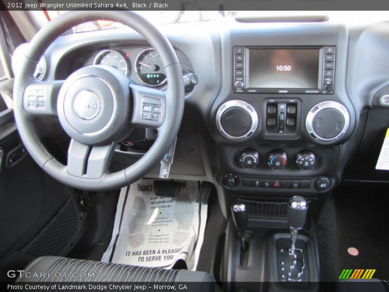 Black / Black 2012 Jeep Wrangler Unlimited Sahara 4x4