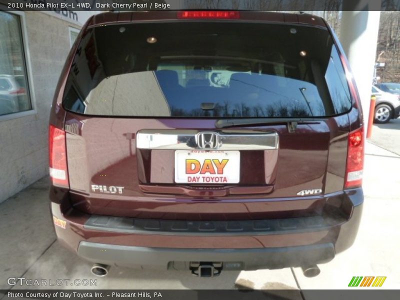 Dark Cherry Pearl / Beige 2010 Honda Pilot EX-L 4WD