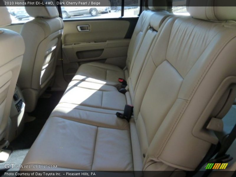 Dark Cherry Pearl / Beige 2010 Honda Pilot EX-L 4WD