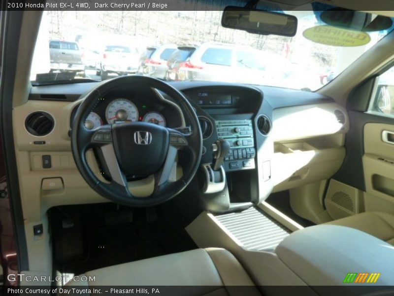 Dark Cherry Pearl / Beige 2010 Honda Pilot EX-L 4WD