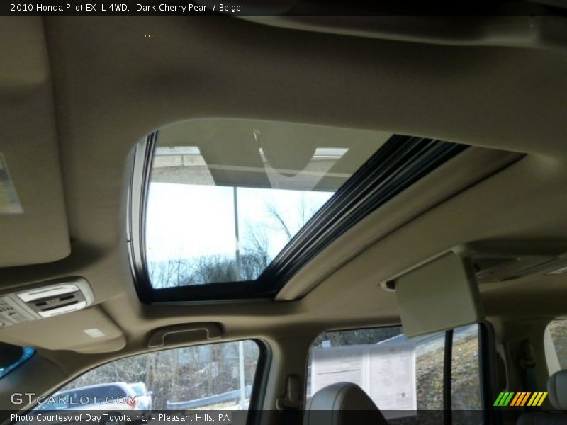 Dark Cherry Pearl / Beige 2010 Honda Pilot EX-L 4WD